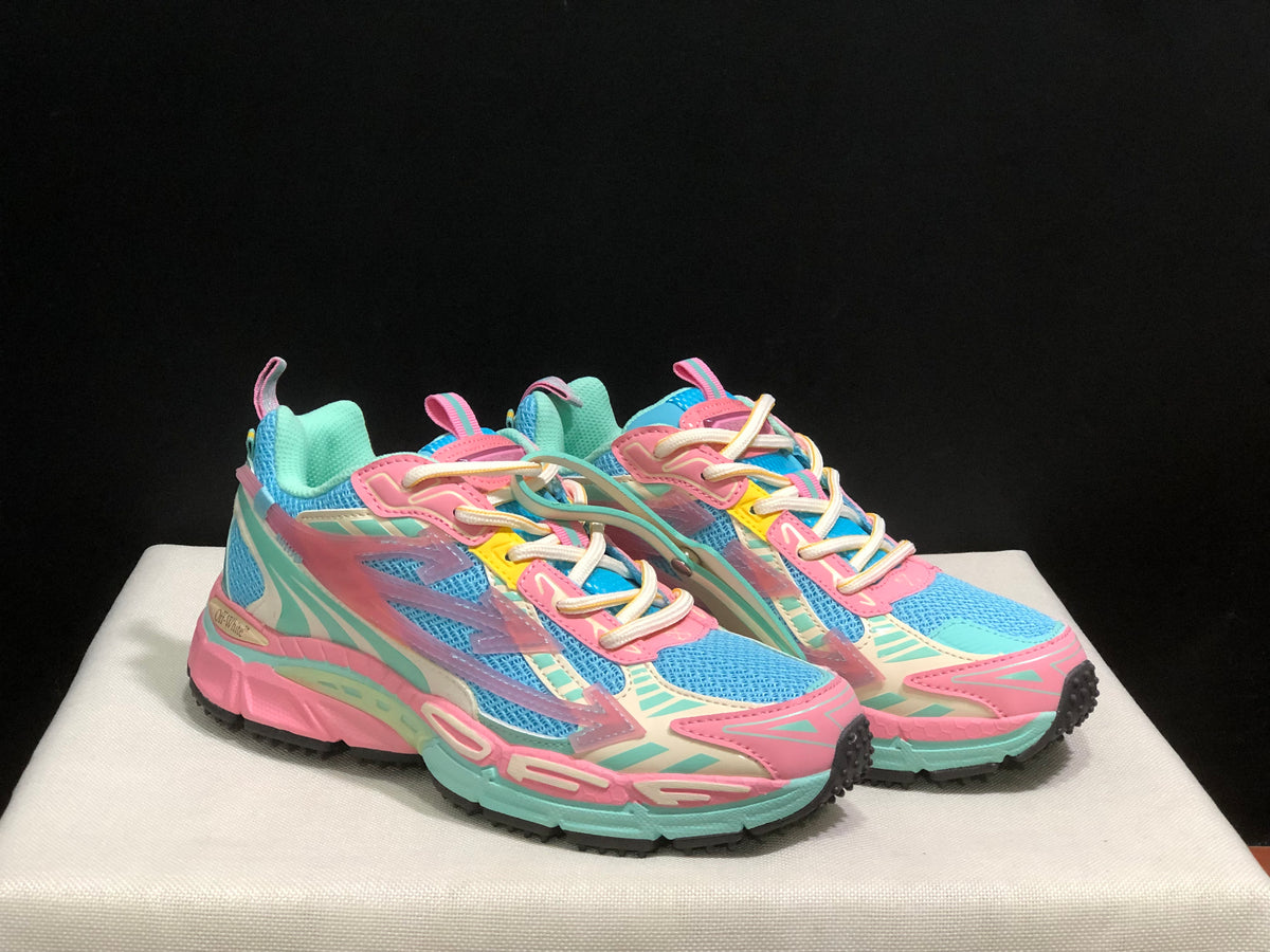 Angled front view highlighting the layered upper, lace-up fastening and multicolor sole design.
