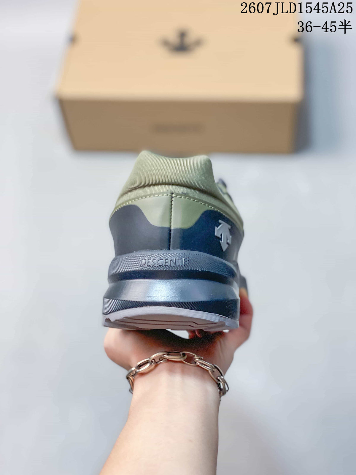 Rear view of the sneaker showing the padded heel collar, layered heel structure, and Descente branding.