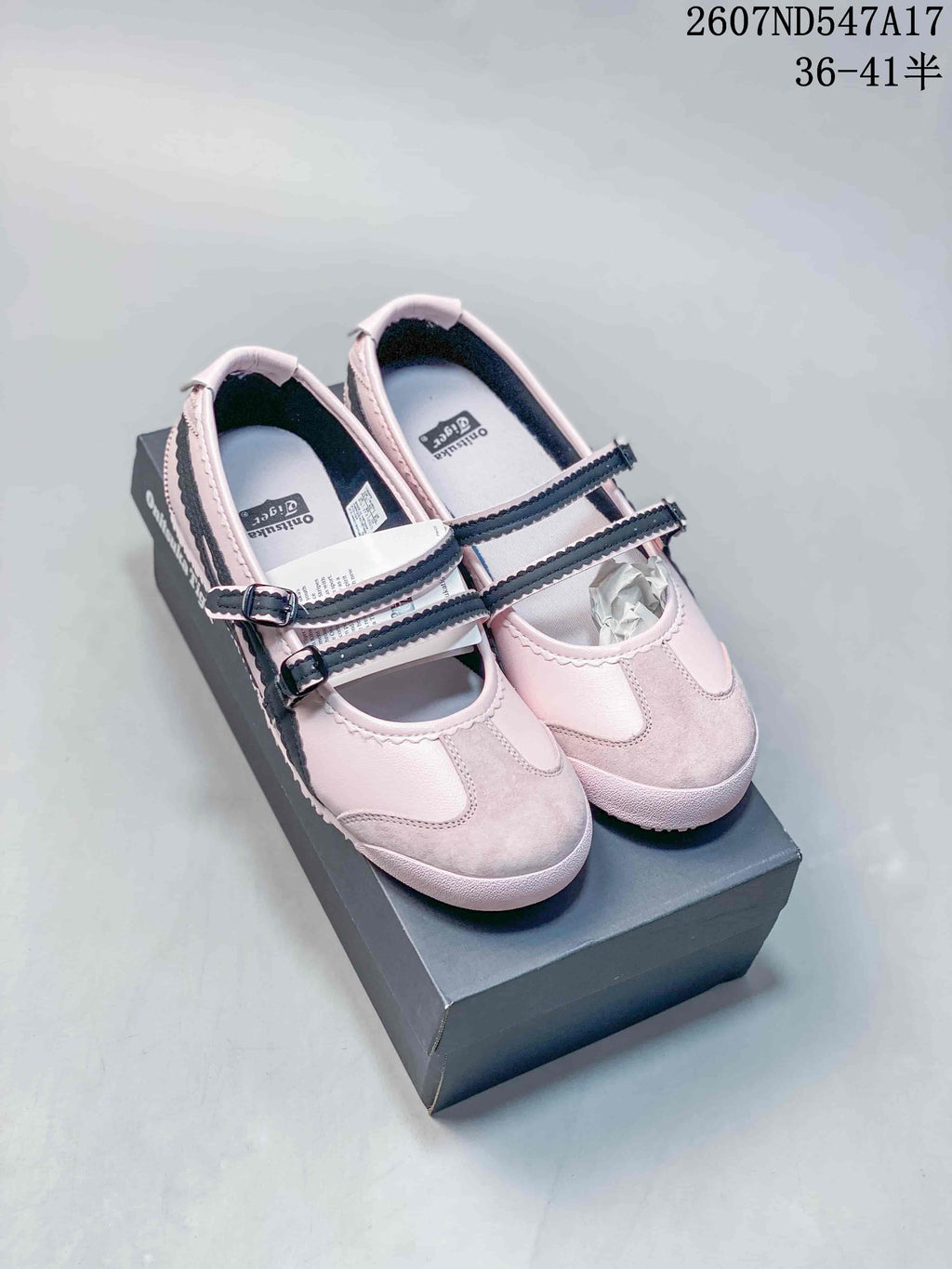 Pair of pale pink Mary Jane sneakers with dark side stripes displayed on a shoe box; image text shows style code 2607ND547A17 and sizes 36–41.5.