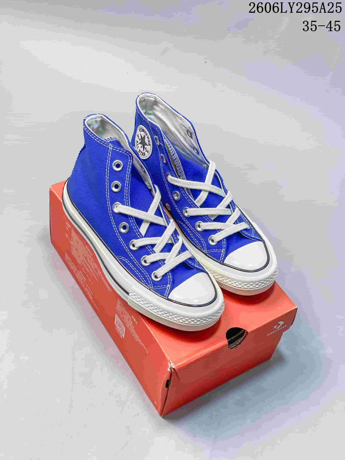 Blue Converse Chuck Taylor All Star high-top sneakers displayed on an orange shoebox; image text shows style code 2606LY295A25 and size range 35–45.