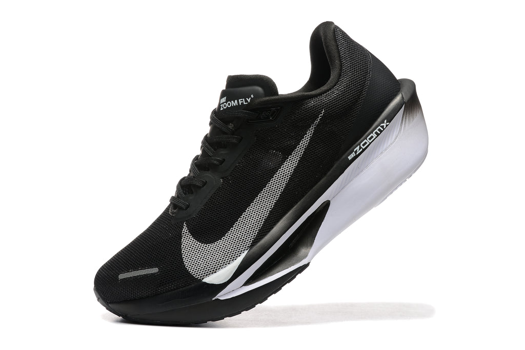 Close view of a black Nike Zoom Fly 6 shoe with a light-colored swoosh