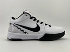 Side profile highlighting the Swoosh and checkerboard heel detail