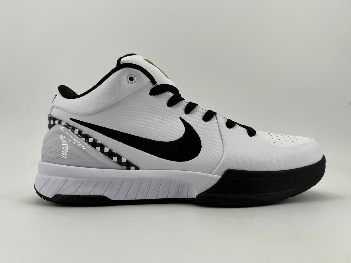 Side profile highlighting the Swoosh and checkerboard heel detail