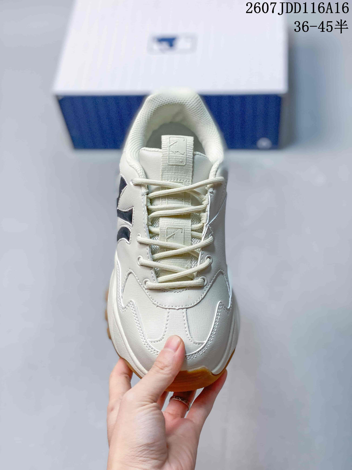 Top view of the sneaker showing the lace-up construction, tongue and layered toe panel.