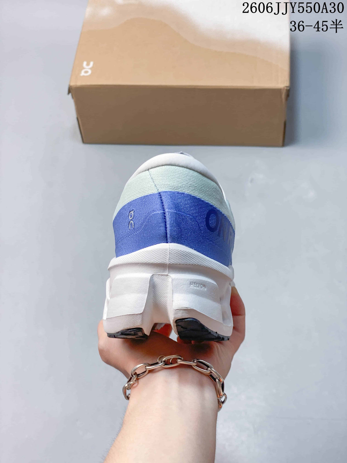Rear view of the shoe showing the blue heel panel and sculpted sole