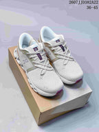 Pair of light gray On Cloud X 4 sneakers displayed on a shoebox, with style code 2607JJD382A22 and size range 36-45 visible at the top.