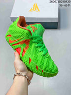 Bright green Nike Ja 3 basketball shoe with orange accents