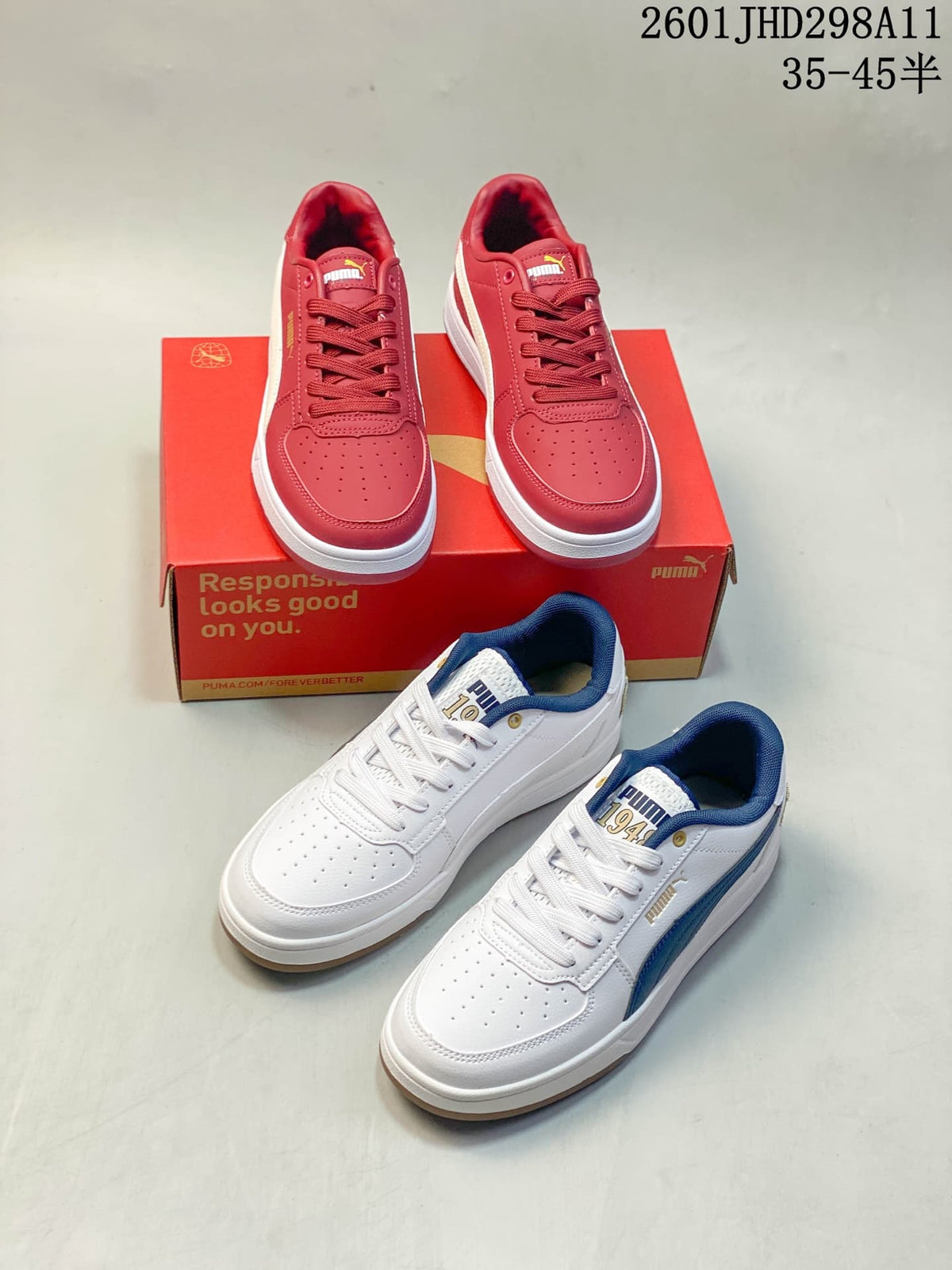 Red and white/navy Puma Caven 2.0 sneakers shown together with a Puma shoebox.