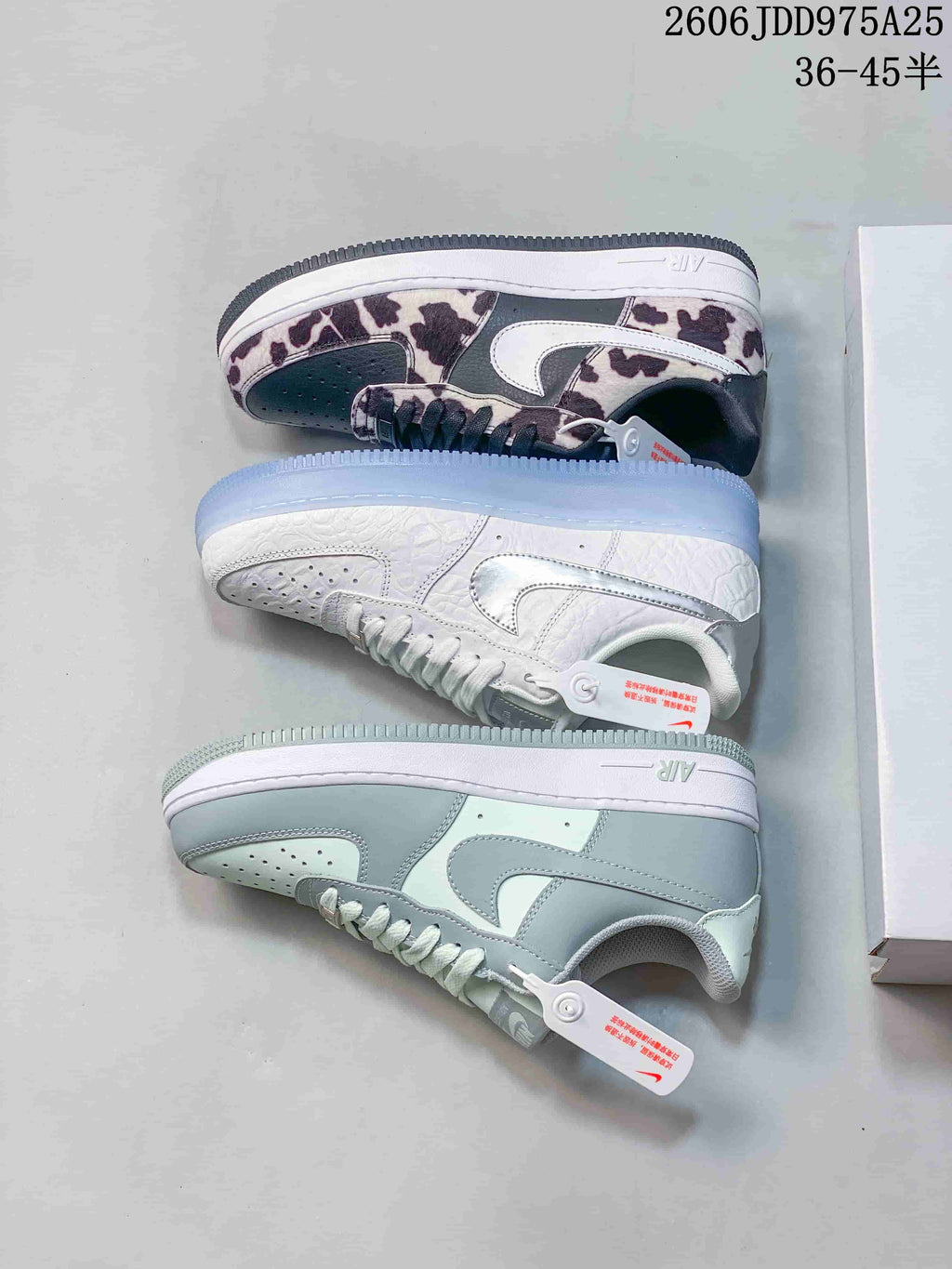 Three low-top sneaker colorways shown from the side, including white, pale blue, and cow print