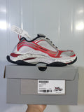 ASICS 1169 grey, red and white sneaker shown on its box, with the box label visible.