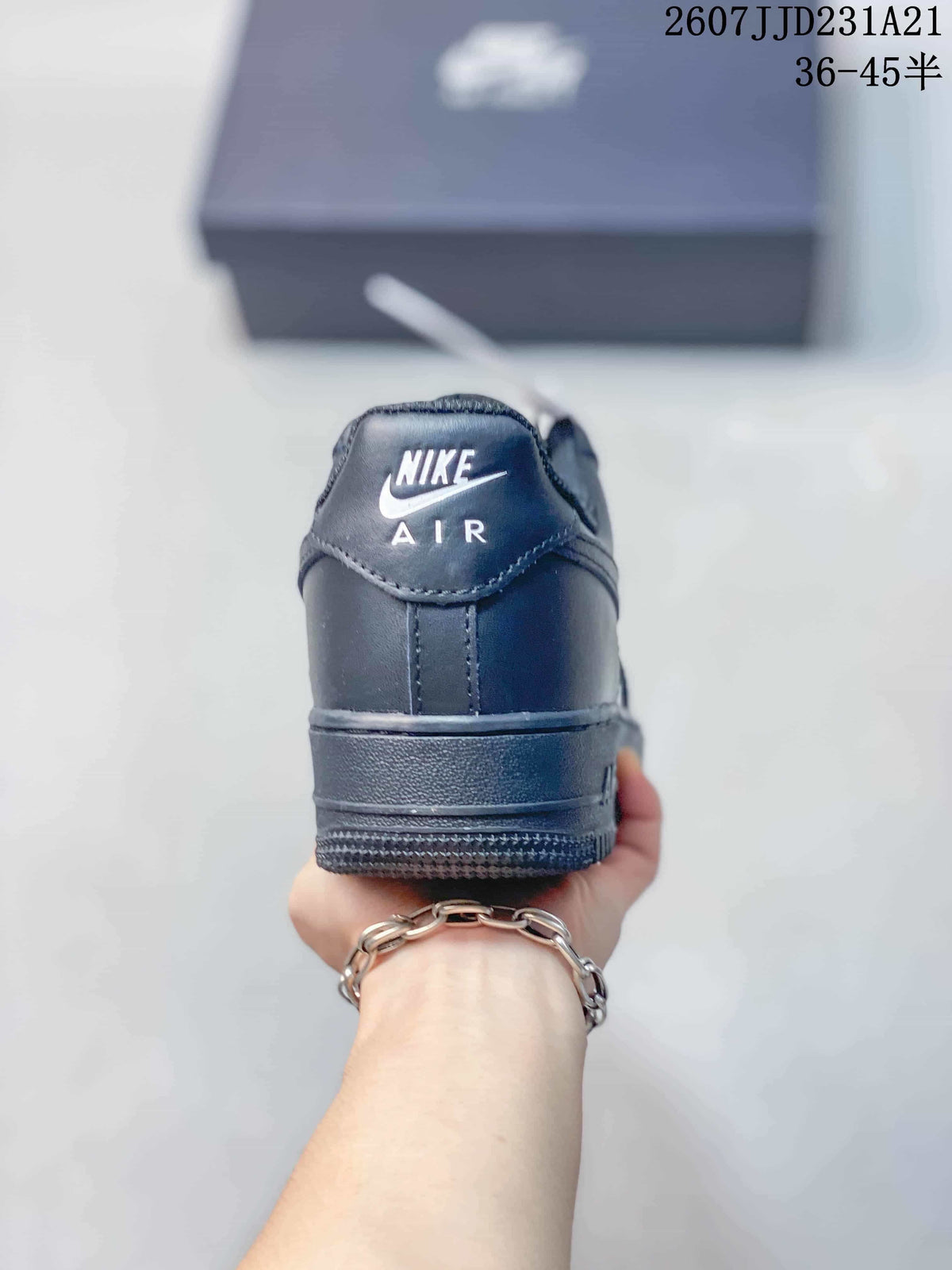 Rear view of a black sneaker showing the Nike Air heel marking and padded collar.