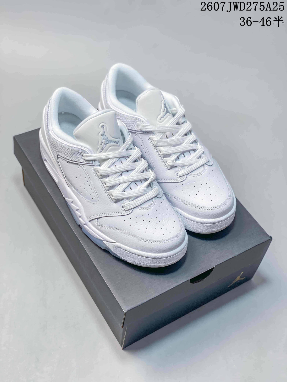 Pair of white Nike Air Jordan Sixty Plus Low sneakers displayed on a black shoebox.