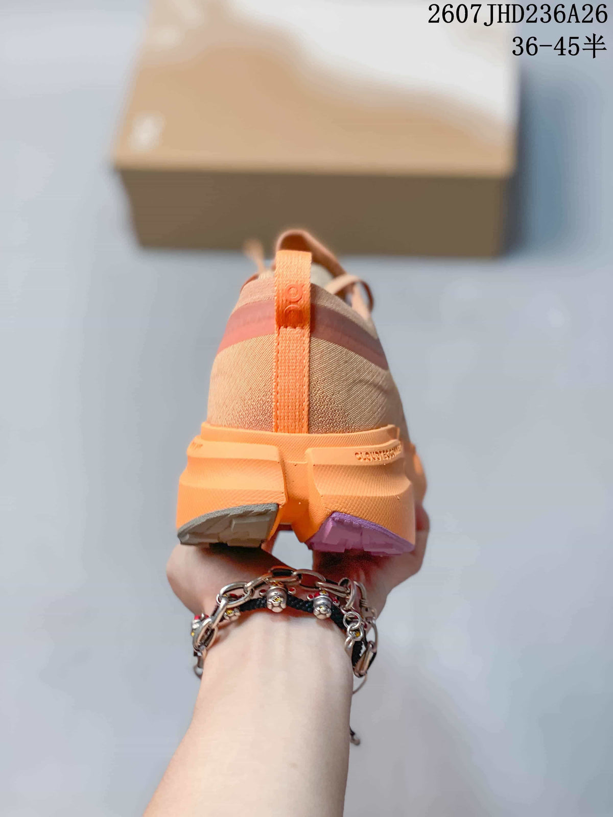 Rear view showing the heel pull tab, layered heel structure, and contrasting outsole sections.