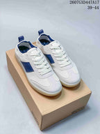 Pair of white and blue ECCO sneakers displayed on a shoebox, with product code 2607GXD447A17 and size range 39–44 visible above.