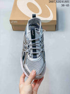 Top view of a silver-toned ASICS GT-2160 Breeze sneaker showing open mesh panels and elastic laces.