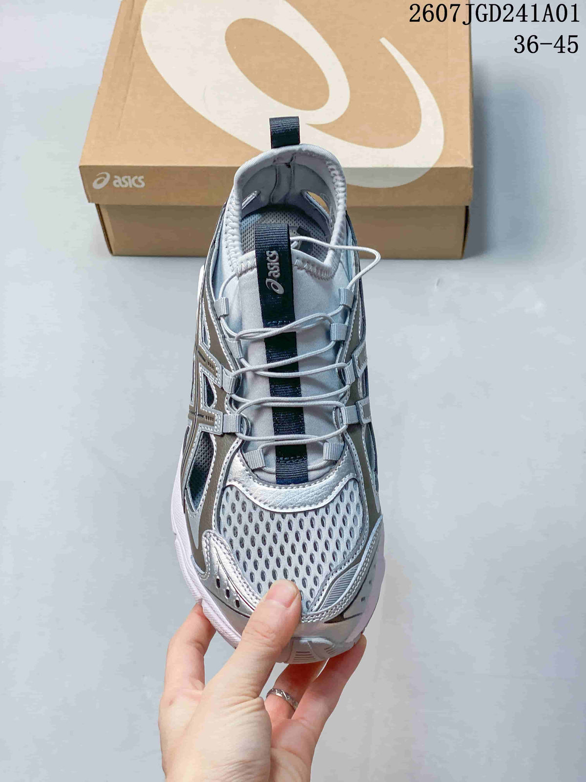 Top view of a silver-toned ASICS GT-2160 Breeze sneaker showing open mesh panels and elastic laces.