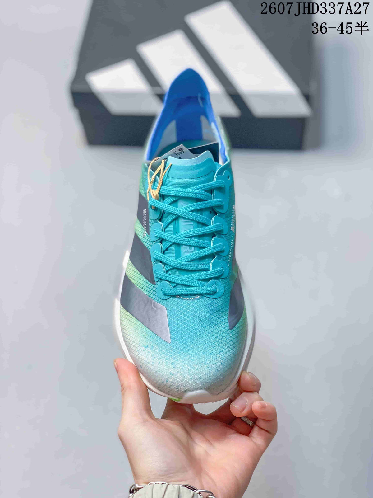Top view of the aqua sneaker showing the turquoise laces, textured upper, and contrasting dark gray side elements.