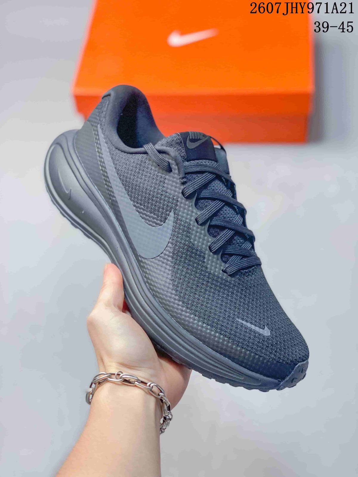 Angled side view of the black Nike sneaker showing the textured upper, Swoosh branding, and layered sole.
