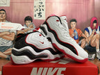 Angled view showing the layered side panels and speckled midsole