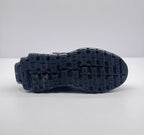 Underside view showing the segmented black rubber outsole tread.
