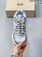 Top view highlighting the laces and layered upper of the Trispeed 3000 Trainer