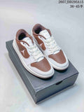 Pair of white and brown Jordan low-top sneakers displayed on a shoebox; image text shows style code 2607JDD295A15 and size range 36–45.