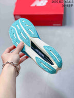 Close view of the turquoise patterned outsole and central midsole section.