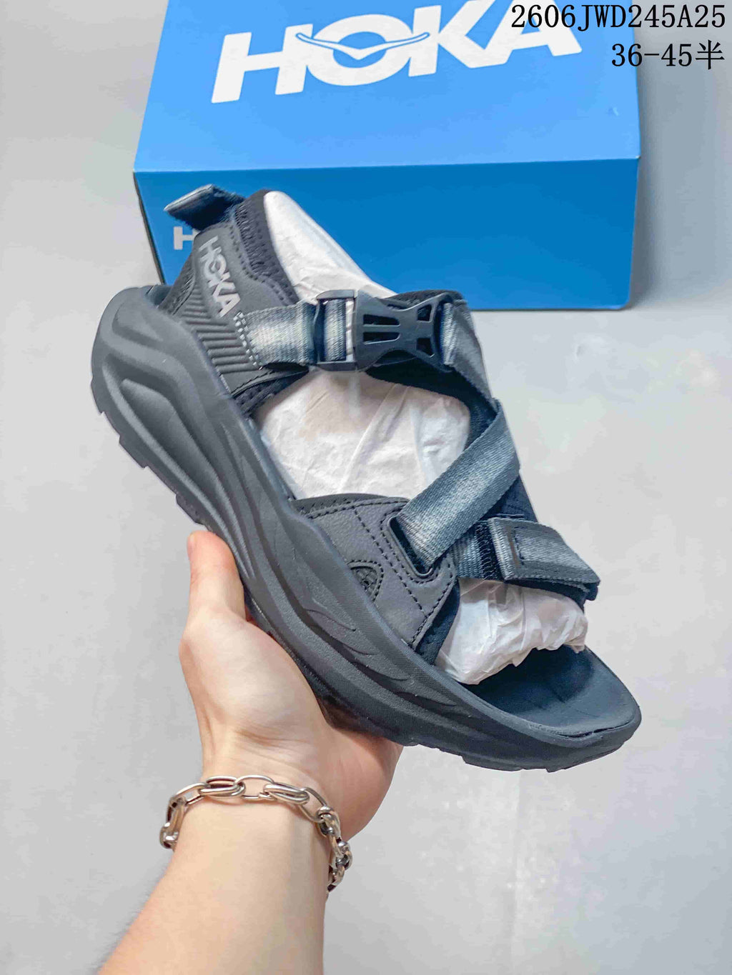 Charcoal HOKA Infini Hike TC sandal with adjustable straps and buckle