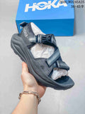 Charcoal HOKA Infini Hike TC sandal with adjustable straps and buckle