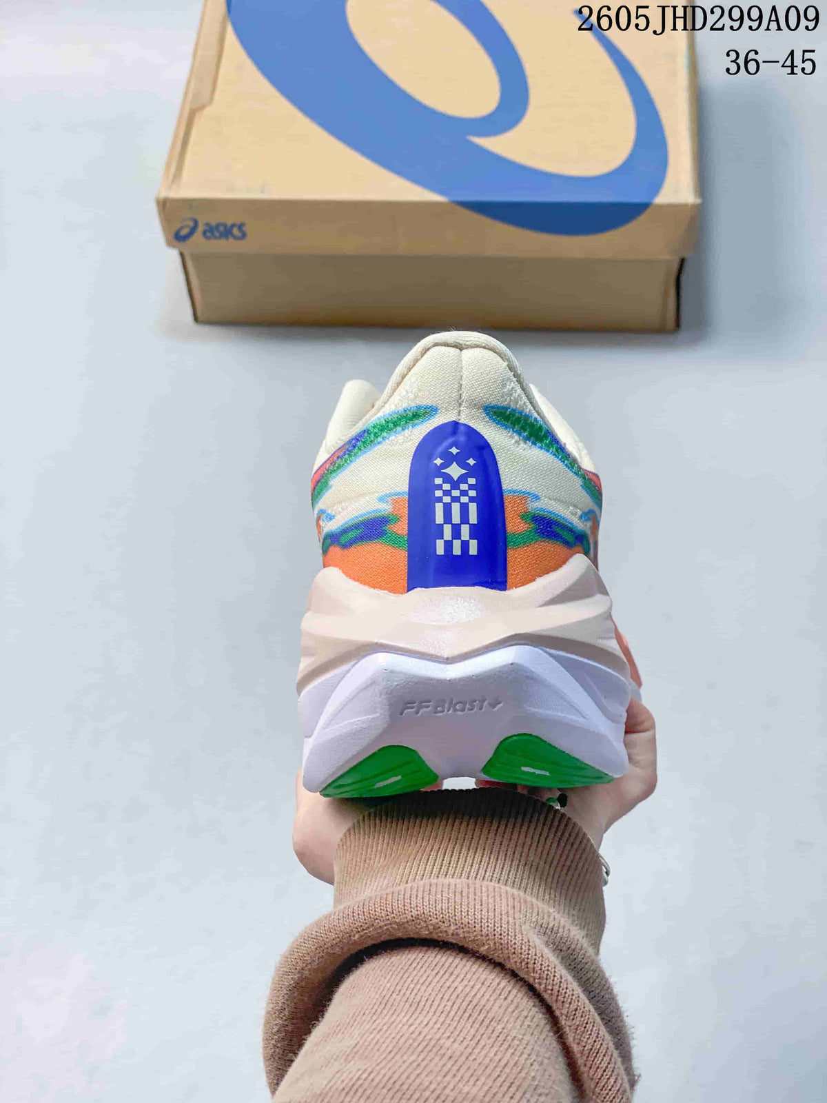 Rear view of the shoe showing colorful heel graphics and sole details