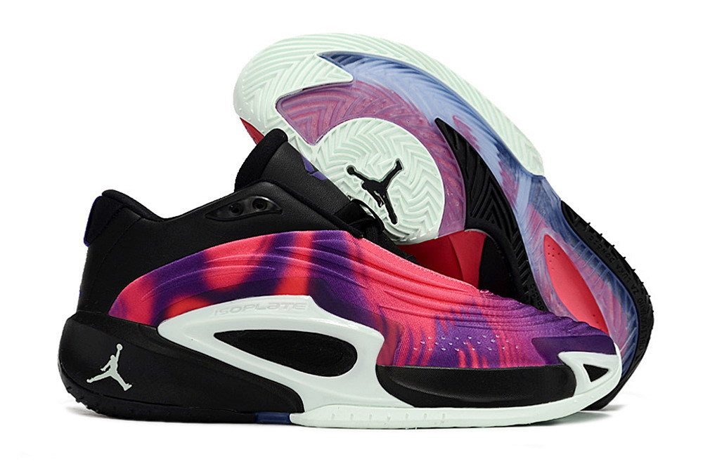 Side and outsole views of black Jordan Luka 3 shoes with magenta and purple accents