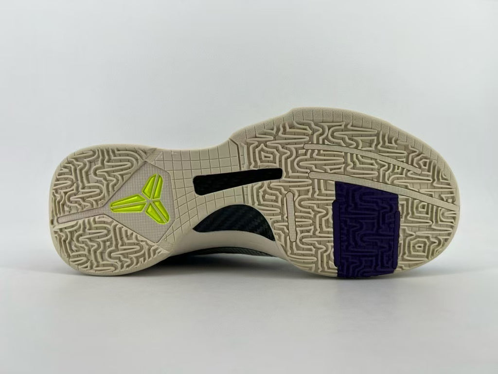 Full outsole view showing the tread pattern and colored inserts