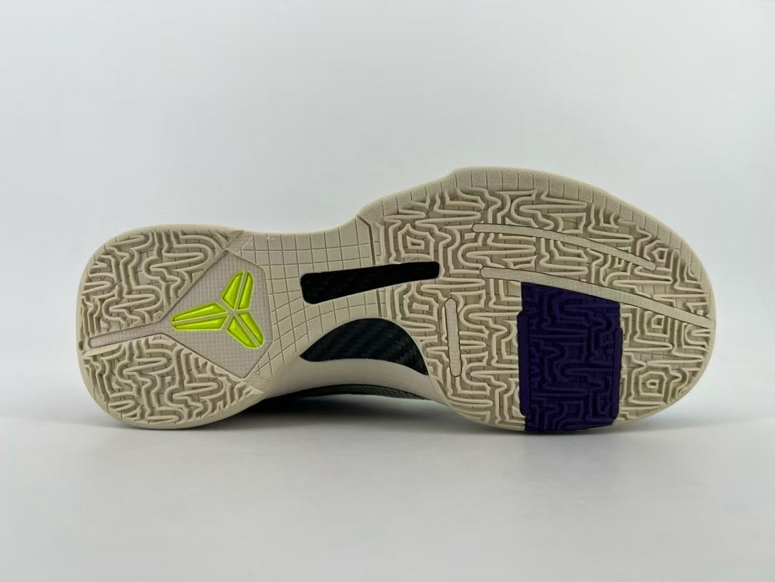 Full outsole view showing the tread pattern and colored inserts