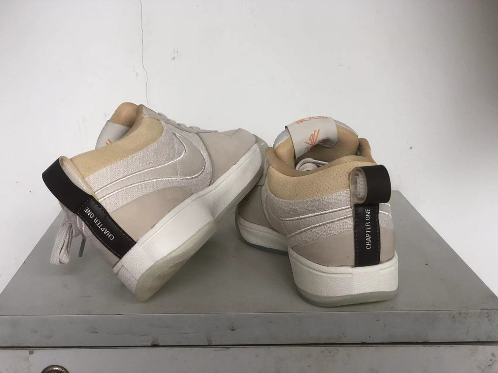 Rear view of the Nike Book 1 shoes, including the heel tabs marked Chapter One.