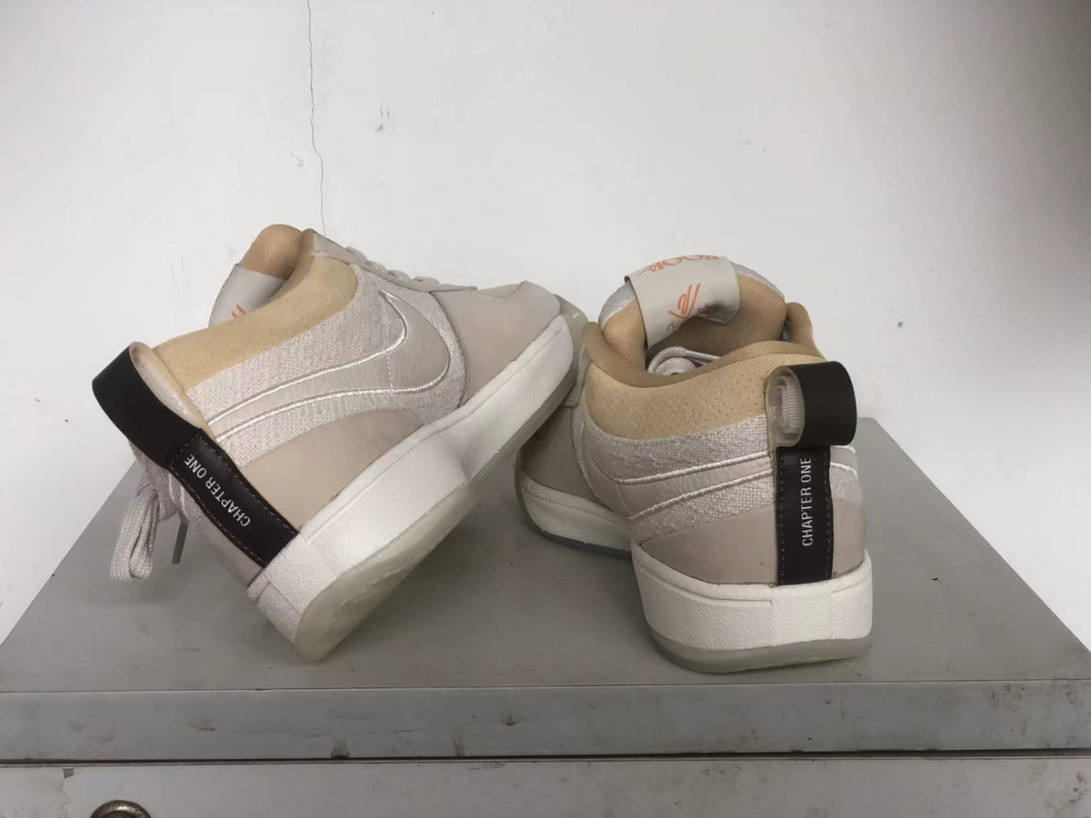 Rear view of the Nike Book 1 shoes, including the heel tabs marked Chapter One.