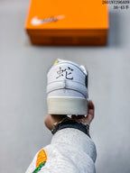 Rear view showing the white heel panels, textured finish, and stitched detail.