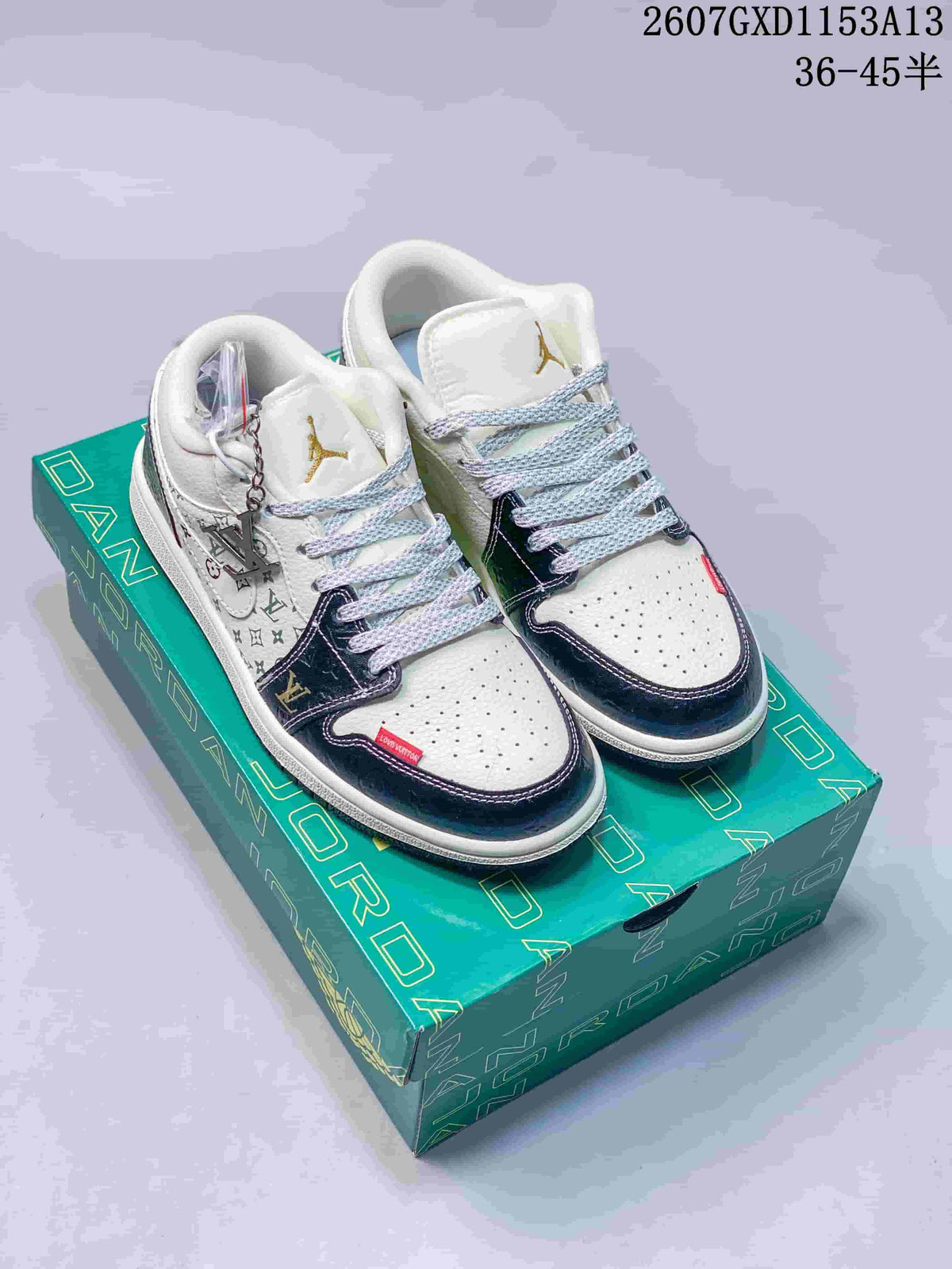 Pair of white and dark navy Nike SB Dunk Low sneakers displayed on a green presentation box.