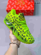 Bright lime Nike Ja 3 shoe with dark horse silhouettes, matching laces, and a striped tongue panel.