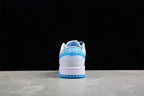 Rear view of the sneaker showing the blue heel detail, white heel panel, padded collar, and blue outsole.
