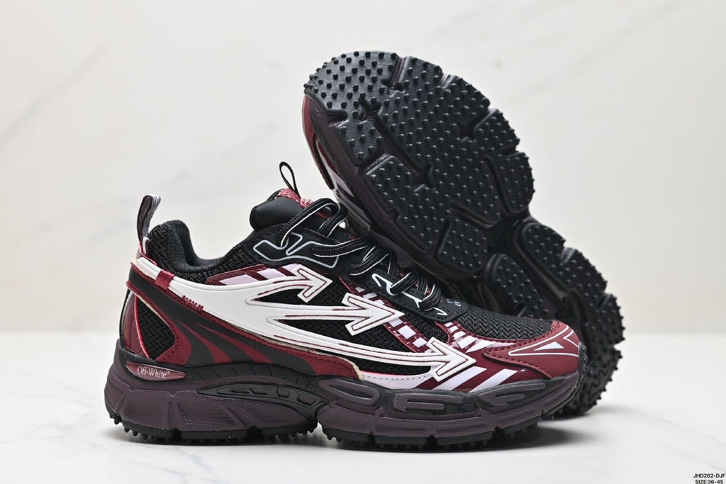 Pair of burgundy, black, and white Be Right Back sneakers shown from the side, with one shoe lifted to show the lugged outsole.