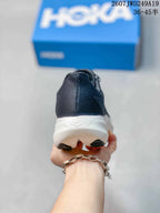 Rear view showing the dark heel counter, white midsole and outsole contact areas.