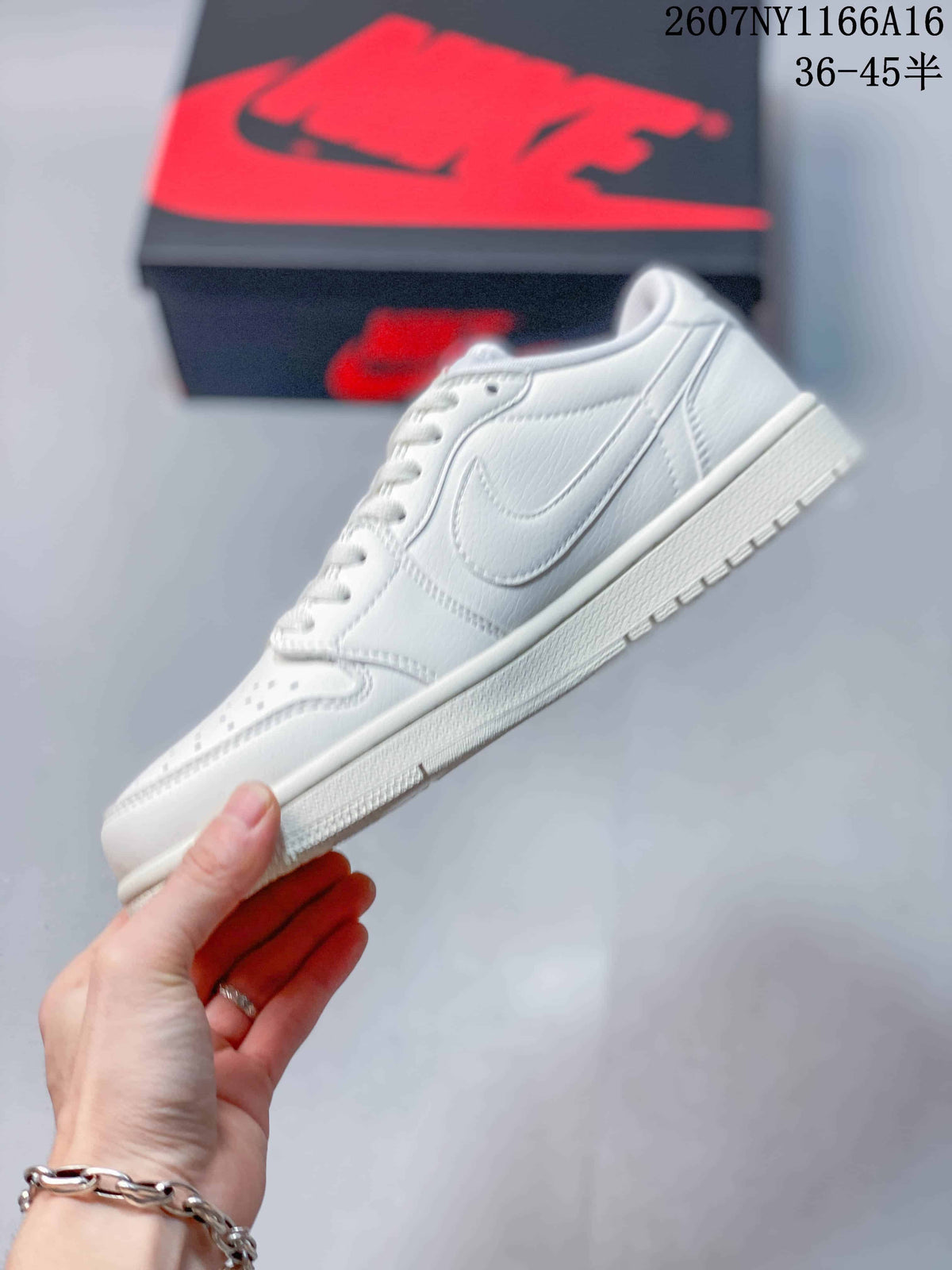 Side profile of a white low-top sneaker showing the stitched swoosh panel, perforated toe area, flat midsole, and textured outsole.