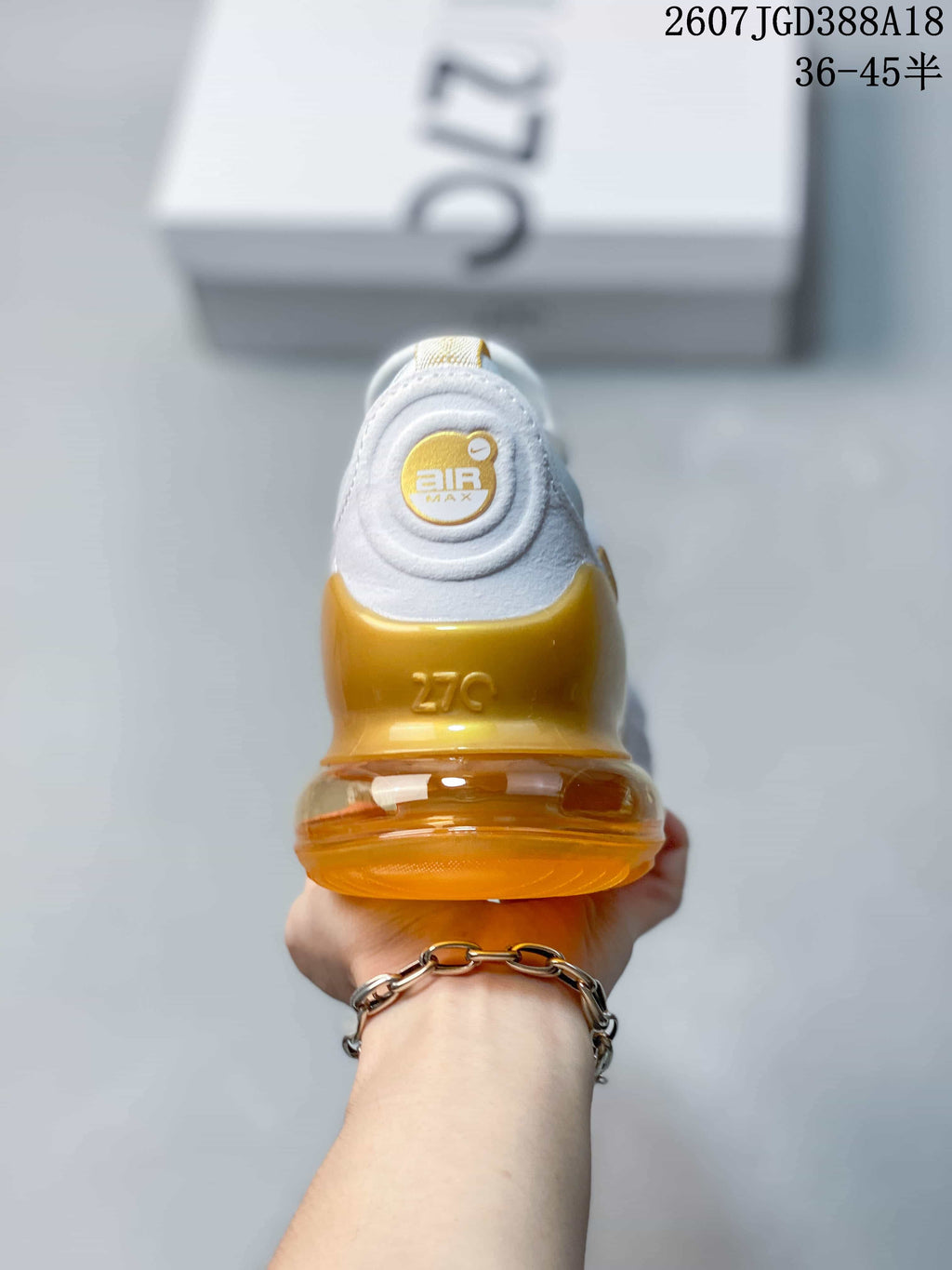 Rear view highlighting the gold-toned heel structure and Air Max branding.