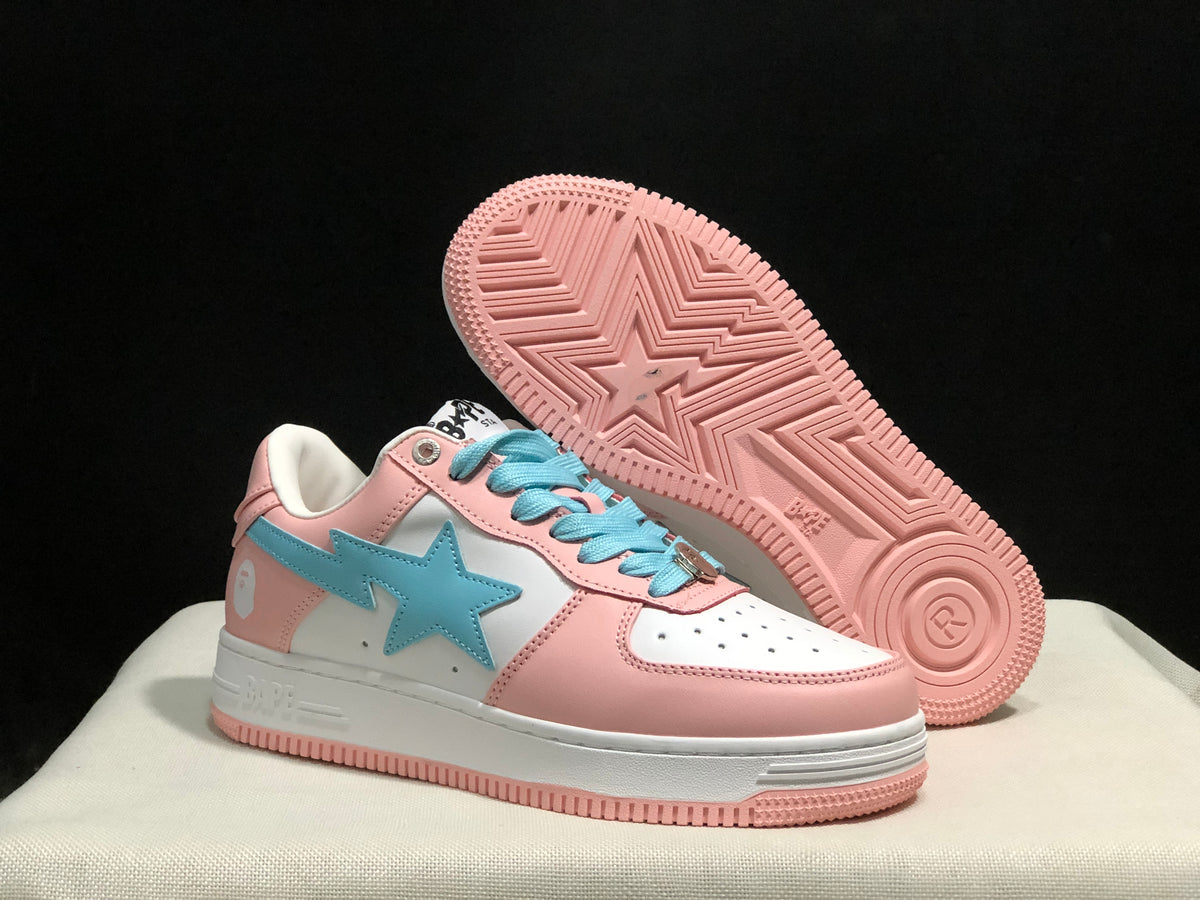 Angled view of the sneaker and its exposed pink outsole with geometric tread and a central star motif.