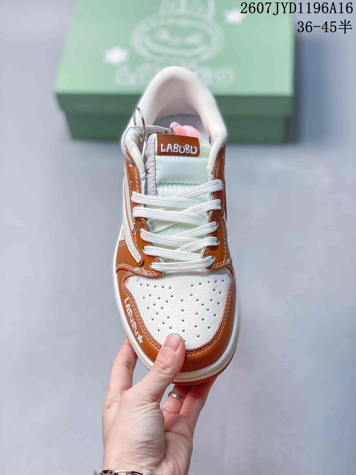 Top view showing white laces, perforated toe panels, brown overlays, and Labubu tongue branding.