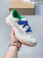 Side view of an off-white On Cloudnova Moon sneaker with blue laces and green lining.