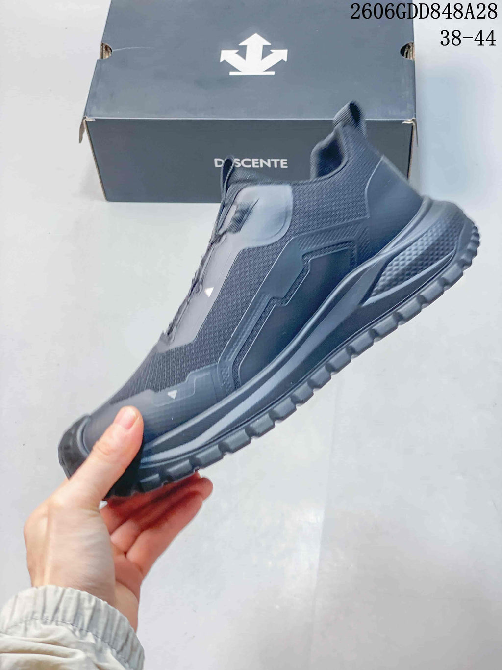 Side profile showing the charcoal upper, dial closure and rugged outsole; image states sizes 38–44 and style code 2606GDD848A28.