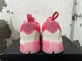 Rear view of the pink and cream Adidas Dame 9 basketball shoes