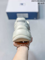 Rear view of the sneaker showing the raised heel structure and Yankees lettering.