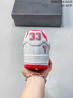 Rear view showing the red-and-white heel details and number 33 graphic.